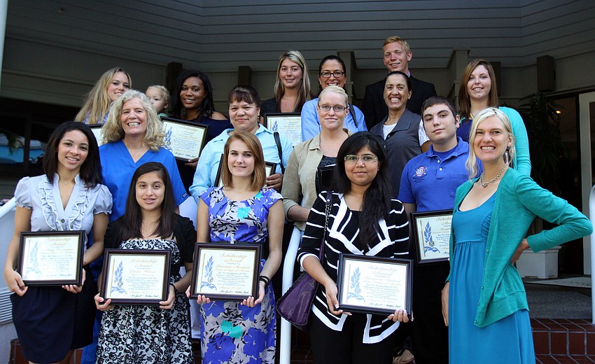 The winners of the Kiwanis academic and technical institute scholarships pose together Thursday, Aug. 18, on the steps by The Grill.