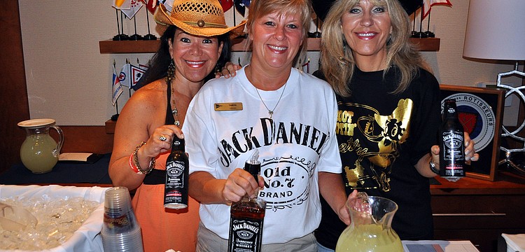Sandra Ceshker, Tamera Jackson and Betty Pawlowitz pose with Jack Danielâ€™s and lemonade Saturday, Aug. 20 at the Sarasota Yacht Club.