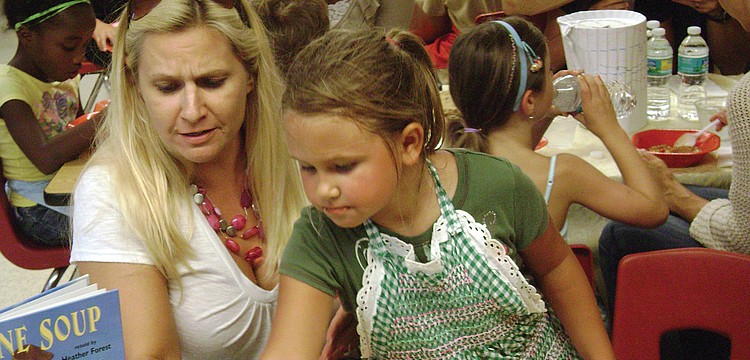 Madelyn Myre served â€˜stone soupâ€™ to her mother, Lisa.