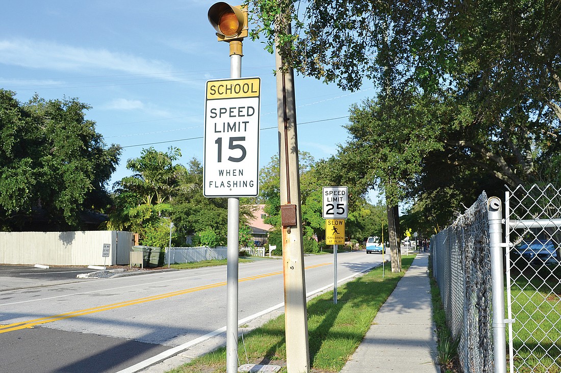 Flashing school speed-limit signs were not working for a brief period of time on the first day of school at Southside Elementary School. Photo by Kurt Schultheis.