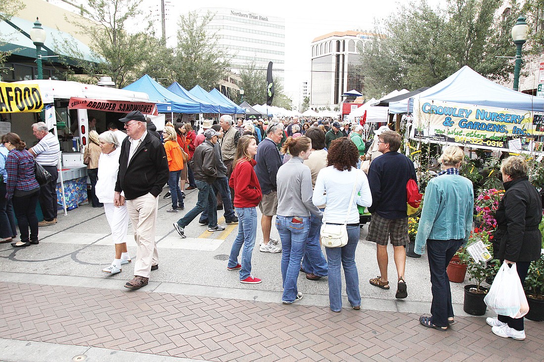 One of the new marketing ideas the Downtown Improvement District suggested at the workshop includes setting up a kiosk at the Sarasota Farmers Market. File photo.