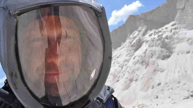 Actor Mike Kradlak portrays an astronaut in an independent film called "Life in a Glass House." Part of the short film is being shot at SMR Aggregates today.