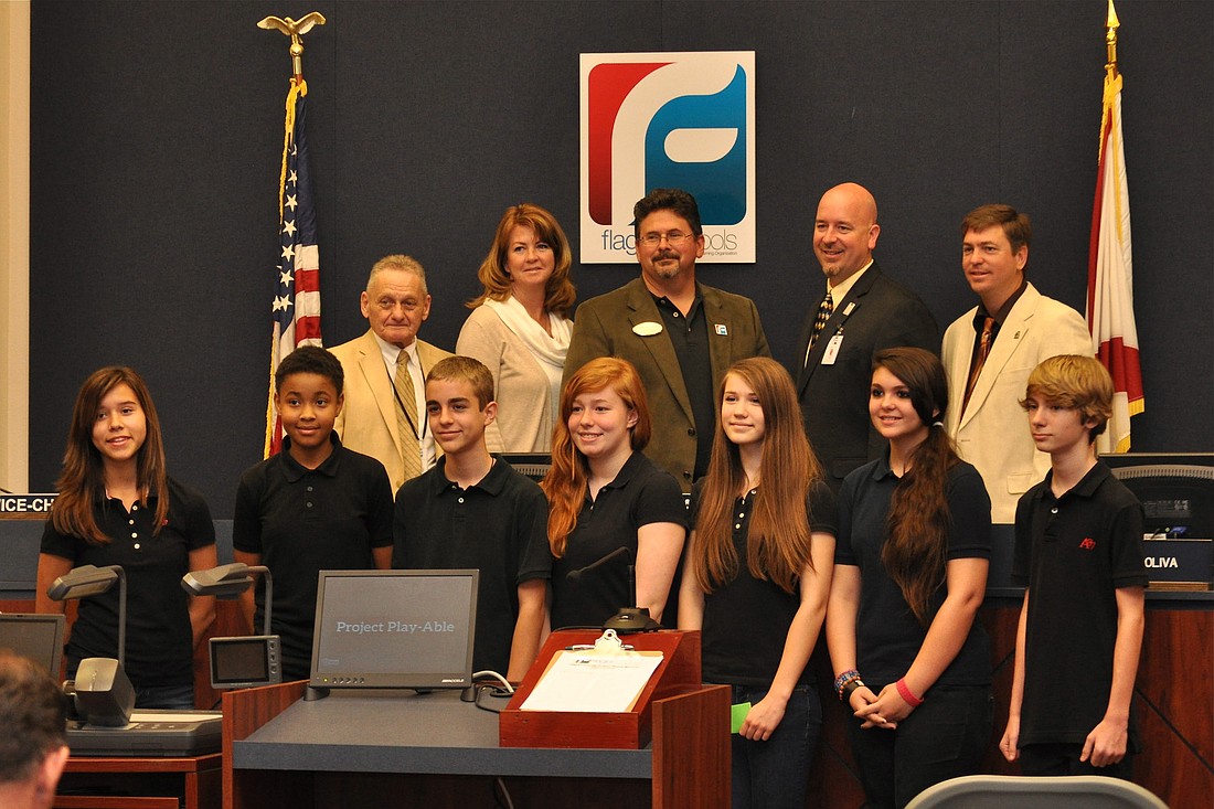 A group of students raising money to make Rymfire Elementary School's playground accessible for disabled kids was honored at Tuesday's meeting. To donate to Project Play-able, go to http://www.gofundme.com/playable.