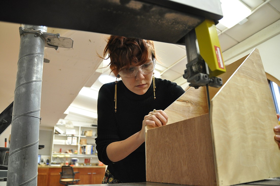 Mahaly Grant works on her project to be displayed at The Closet. PHOTOS BY SHANNA FORTIER