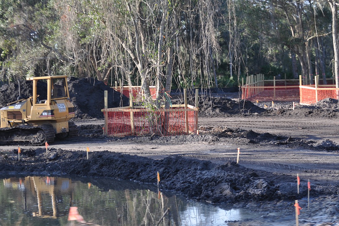 Saboungi Construction is working on the Long Creek Nature Preserve site, which will have a kayak launch and fishing pier when it opens. (Photo by Jonathan Simmons.)
