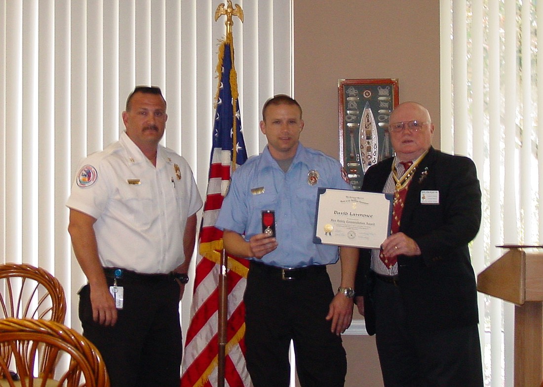 Chief Fire Marshal Joe King, Firefighter Paramedic David Lawrence, SAR President David Kelsey COURTESY PHOTOS