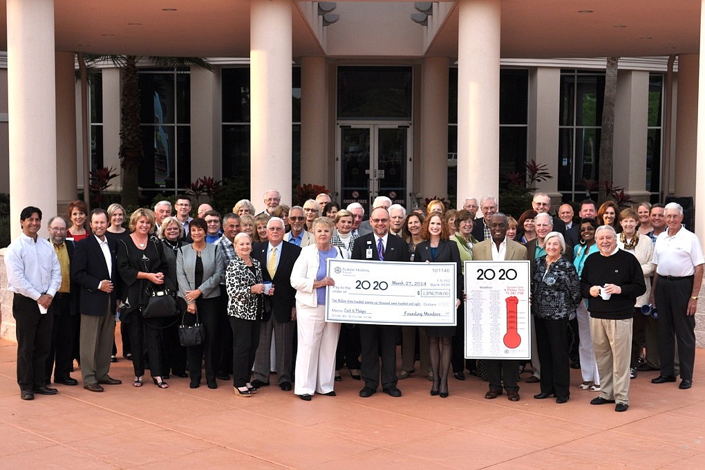 On March 27, the Florida Hospital Flagler FoundationÃ¢â‚¬â„¢s 20/20 Society presented a check to the hospital for nearly $1.4 million, representing the total amount of cash and pledges that have been received. (Courtesy photo.)