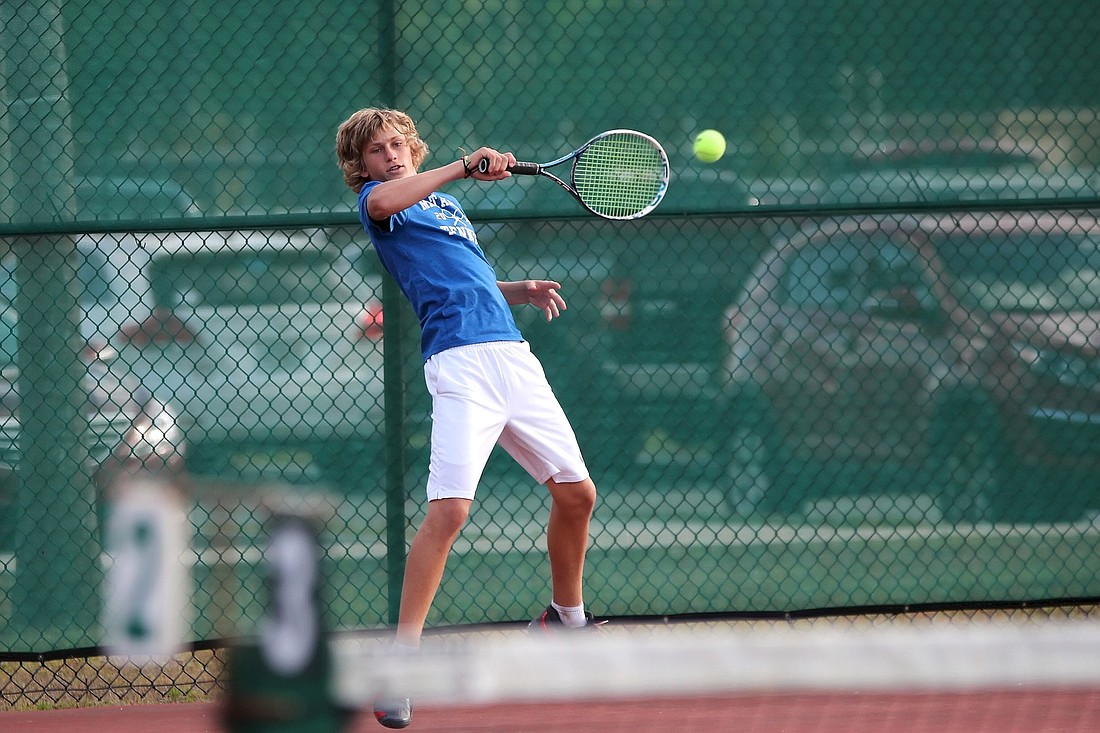 Freshman Sidney Moon is one of two homeschoolers on the Matanzas boys' tennis team. (Photo by Joey LoMonaco)
