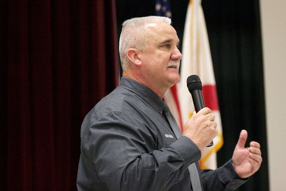 Indian Trails Principal Paul Peacock speaks at the unveiling ceremony for his school's flagship programs. (Photo by Joey LoMonaco)