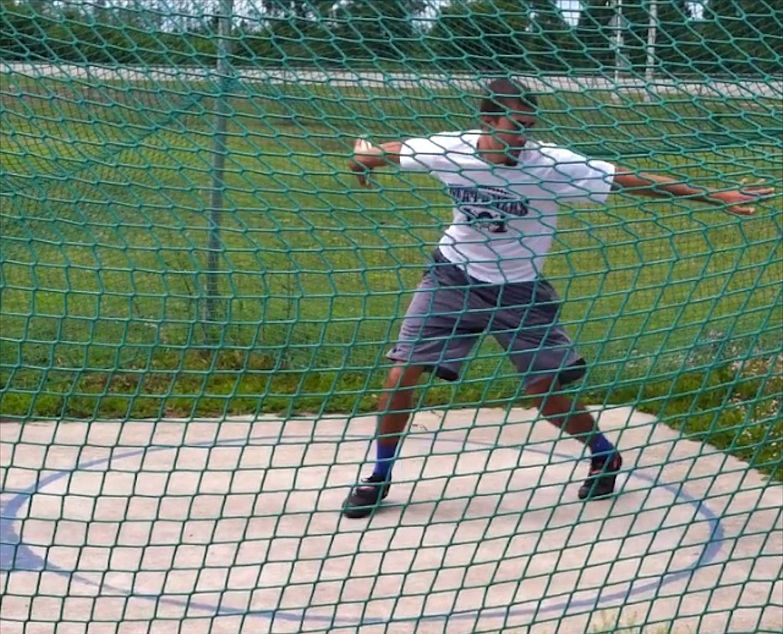 A little more than one year removed from being cut from Matanzas' baseball squad, junior Michael Mohamed set a new school record in the discus. (Courtesy photo)