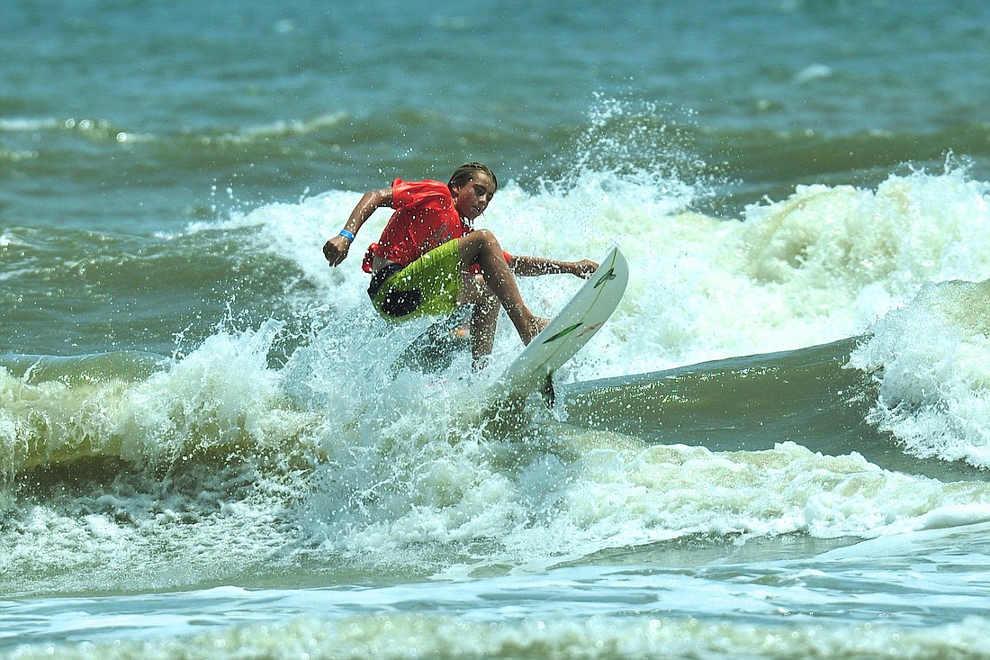 Braeden Kopec, 7, took first place in the open bodyboard event and sixth place in the groms division at the 2014 May Day Memorial Surf Classic May 10. (Photo by Joey LoMonaco.)