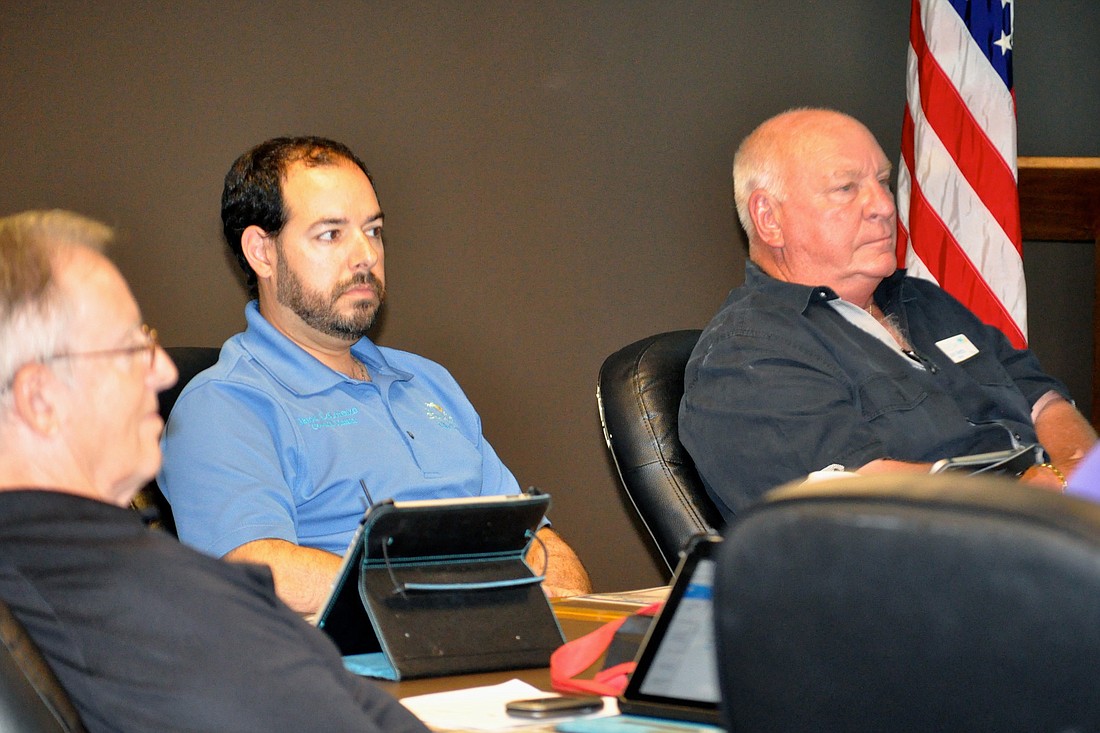 City Councilmen Bill McGuire and Jason DeLorenzo and Mayor jon Netts discussed red light cameras at a City Council workshop May 13. (Photo by Jonathan Simmons.)