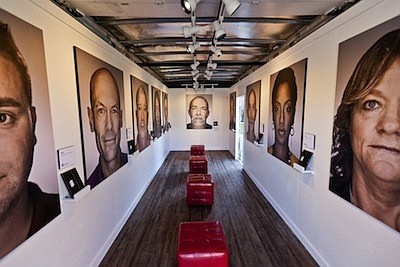 The mobile art exhibit features portraits of HIV-positive Florida residents, who want to share their stories.