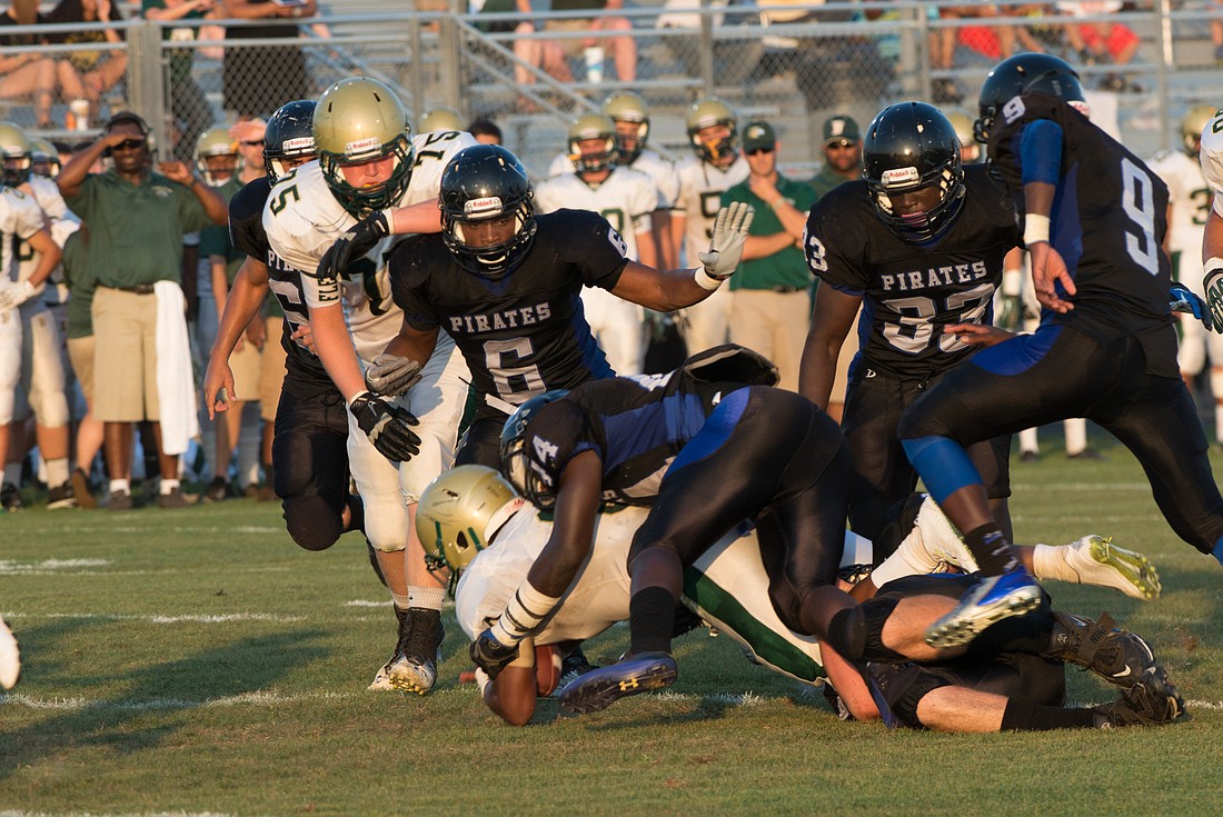 Matanzas linebacker Steverson Jean Louis makes a tackle. (Bob Rollins)