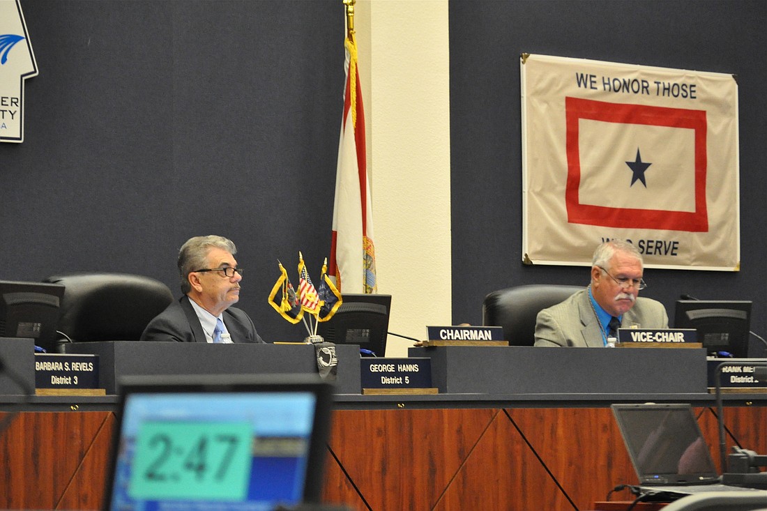 Flagler County Commission Chairman George Hanns and Commissioner Frank Meeker discussed the courthouse during a regular June 2 commission meeting. (Photo by Jonathan Simmons.)