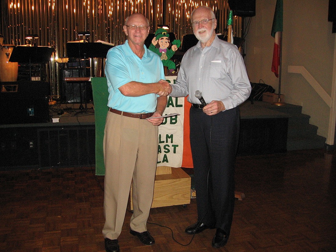 Elmer Stainbrook, hospice representative, and Bernie Sheridan, Chairman of the Irish Social ClubÃ¢â‚¬â„¢s Golf Committee COURTESY PHOTO