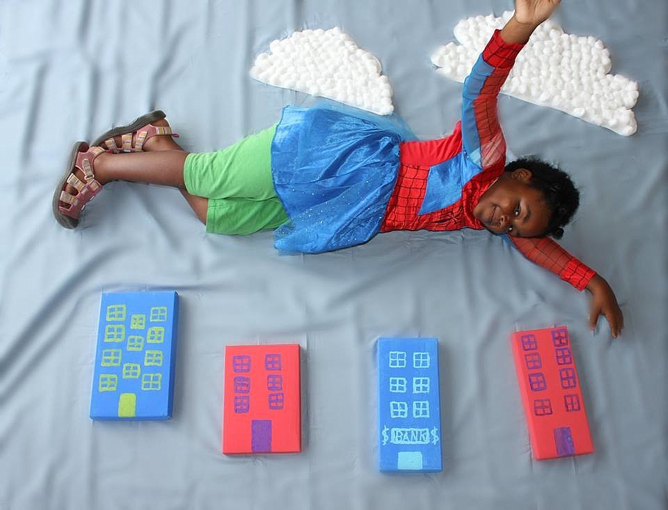 Teesha Guillot poses for the superhero photo op in crafts. COURTESY PHOTOS BY SHARAIN MUELLER