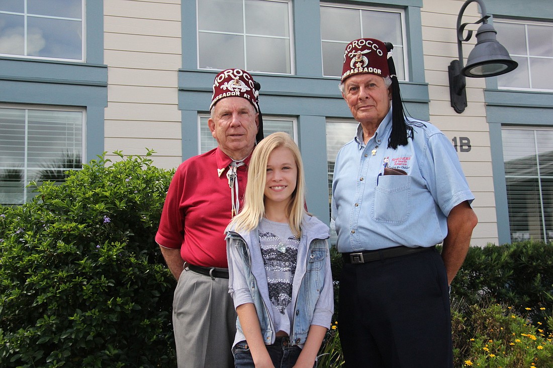 Shriners William Laird and Asa Cohen with Freya Smith PHOTOS BY SHANNA FORTIER