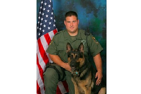 Deputy Dominic Guida and K-9 Cain. Photo courtesy of the Flagler County Sheriff's Office.