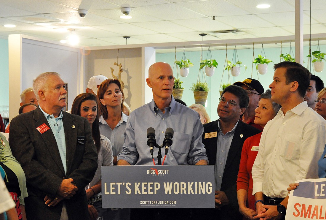 Rick Scott addresses Palm Coast residents during in tax cut tour stop in Palm Coast.