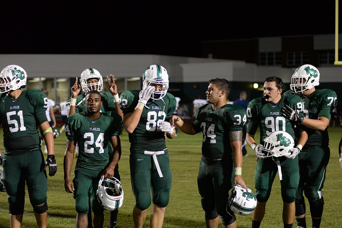 The FPC Bulldogs walk off the field as the victors over Sandalwood.