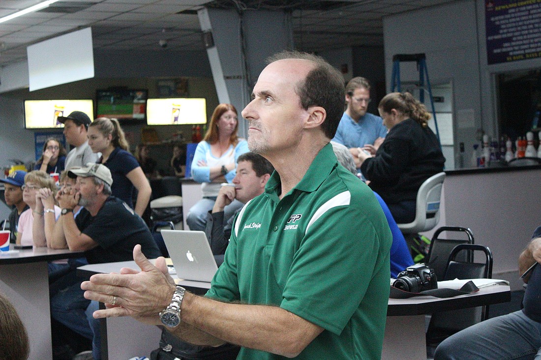 FPC menÃ¢â‚¬â„¢s coach Steve Stripling applauds his team after a season-high score in the first game with 943 points.