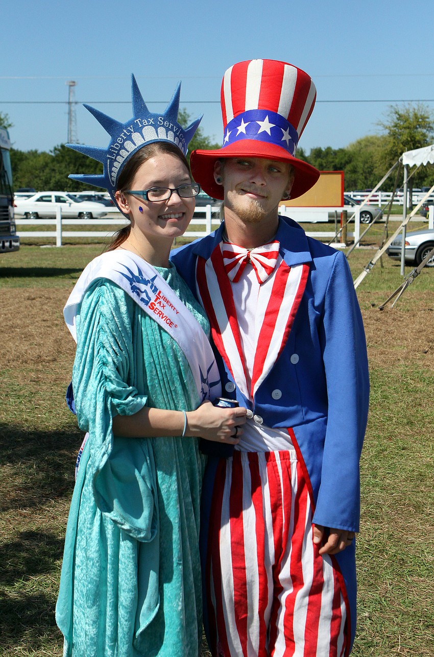 Ashley Blue and Nick Fox were dressed as Lady Liberty and Uncle Sam to promote Liberty Tax's booth on Saturday, March 19, during the Sarasota Springfest out at Palmer Ranch.