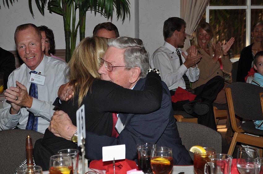 Melissa Owens embraced her father, Kenneth Fake, as soon as she heard she'd won.