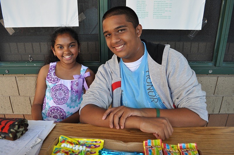 Ariana Rupan and Zach Ali sold candy for the National Junior Honor Society.