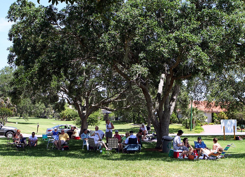 Families enjoy some time together in the shade on Sunday, April 17 during South Bay's Family Fun Day.
