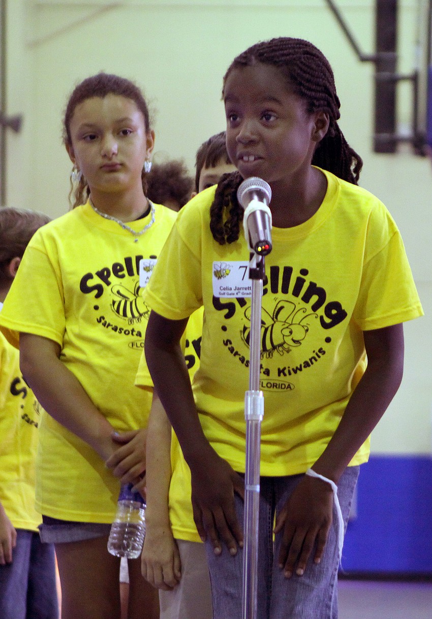 Celia Jarrett slaps her hands on her thighs as she spells one of the words in the Sarasota Kiwanis Club's Spelling Bee Friday, May 13 at the Boys and Girls Club.