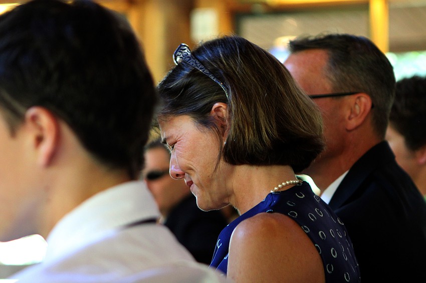 A mother gets teary Friday, June 3 during ODA's 6th grade graduation at Siesta Key Chapel.