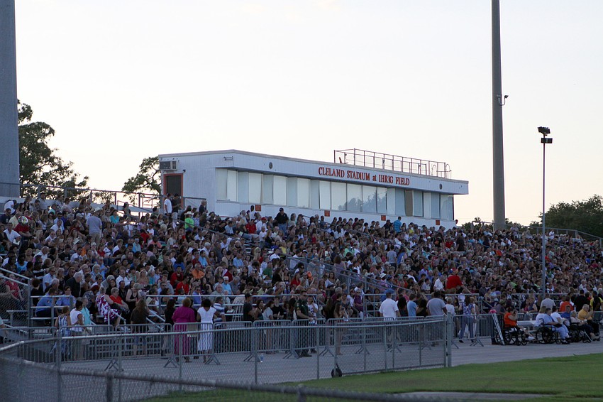 Families and friends made their way to the stands to get ready to watch the graduating class of 2011 Friday, June 3 at Sarasota High School's graduation at Cleland Stadium.