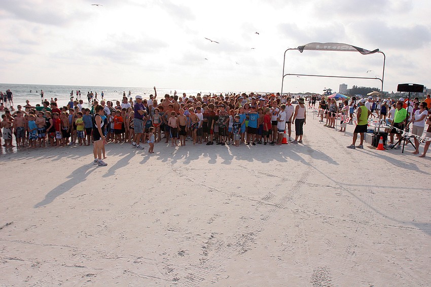 Participants get ready to run in the 1-mile fun run Tuesday, June 14 on Siesta Key Beach.