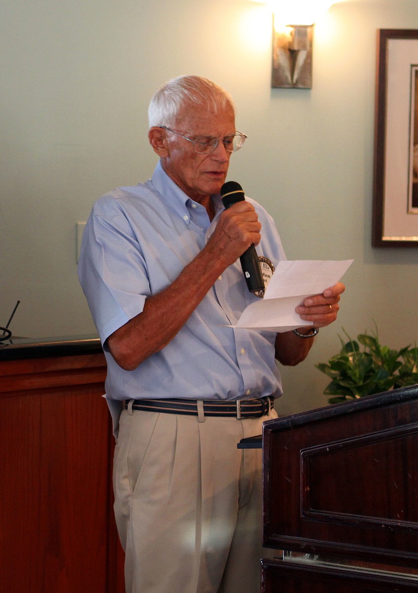 Weldon Frost reads a thank you letter from academic scholarship recipient Timothy Ryan Fiala Thursday, Aug. 18, during the scholarship ceremony at The Grill.