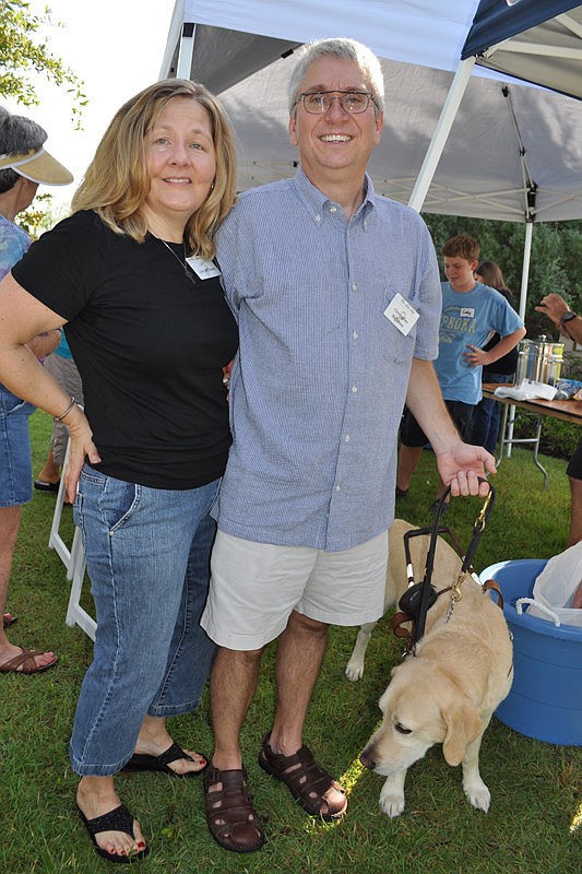 Lynn and Chris McNamee with their dog, Max
