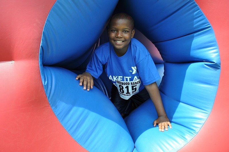 D.J. Nixon, 10, tried out the inflatable obstacle course.