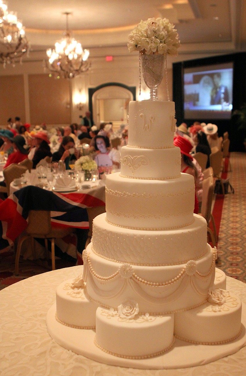 The wedding cake made by pastry designer Denise Rowland and pastry artist Mae Cavazos of the Ritz Carlton.