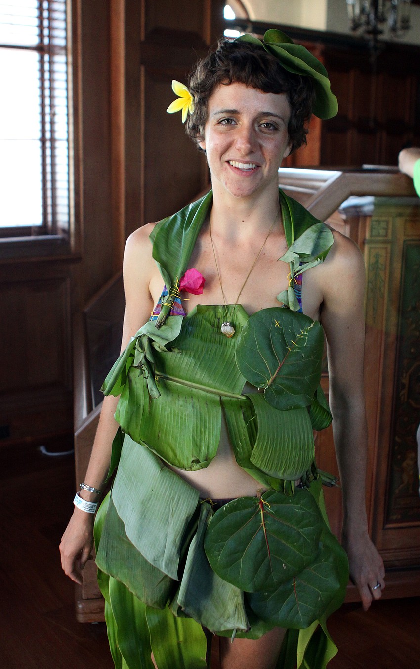 Dinah Juergens poses in her handmade graduation outfit Friday, May 20 inside College Hall.