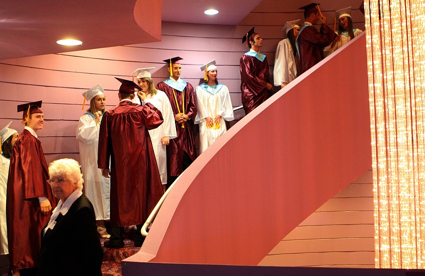 Students wait on the spiral staircase Friday, May 27 at the Van Wezel Performing Arts Hall.
