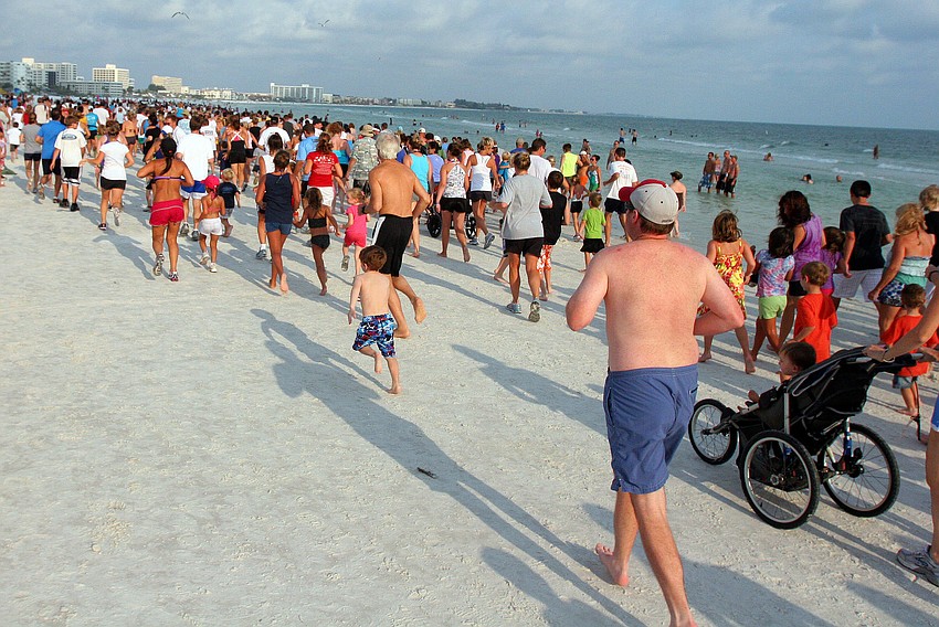Over 300 people participated in the 1-mile fun run Tuesday, June 14 on Siesta Key Beach.