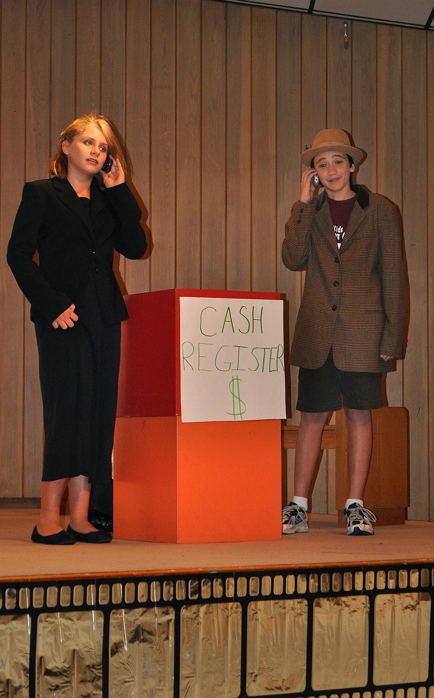 Olivia Fox, as Evil Villainess Bella, and Camden Jenkins, as Detective Steve, start of their mystery show, 
