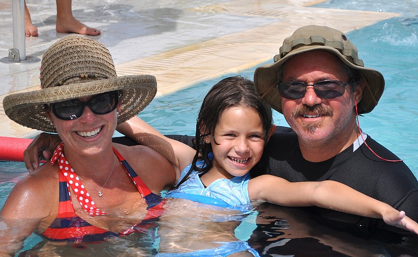 Laurie, Carly, 7, and Commodore Jeff Birnbach