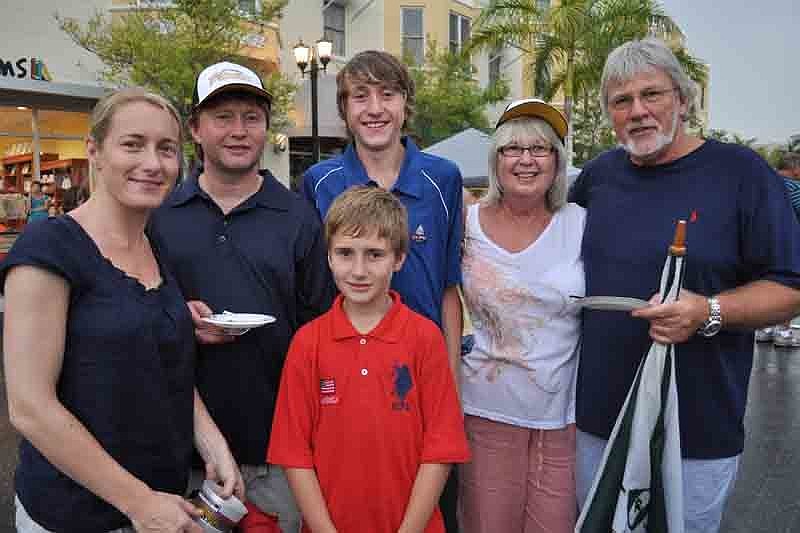 Wendy and Simon Trevena and their children Jack, center, and Sam, front, had just arrived from England to visit their family, Trish and Mike Trevena, right.