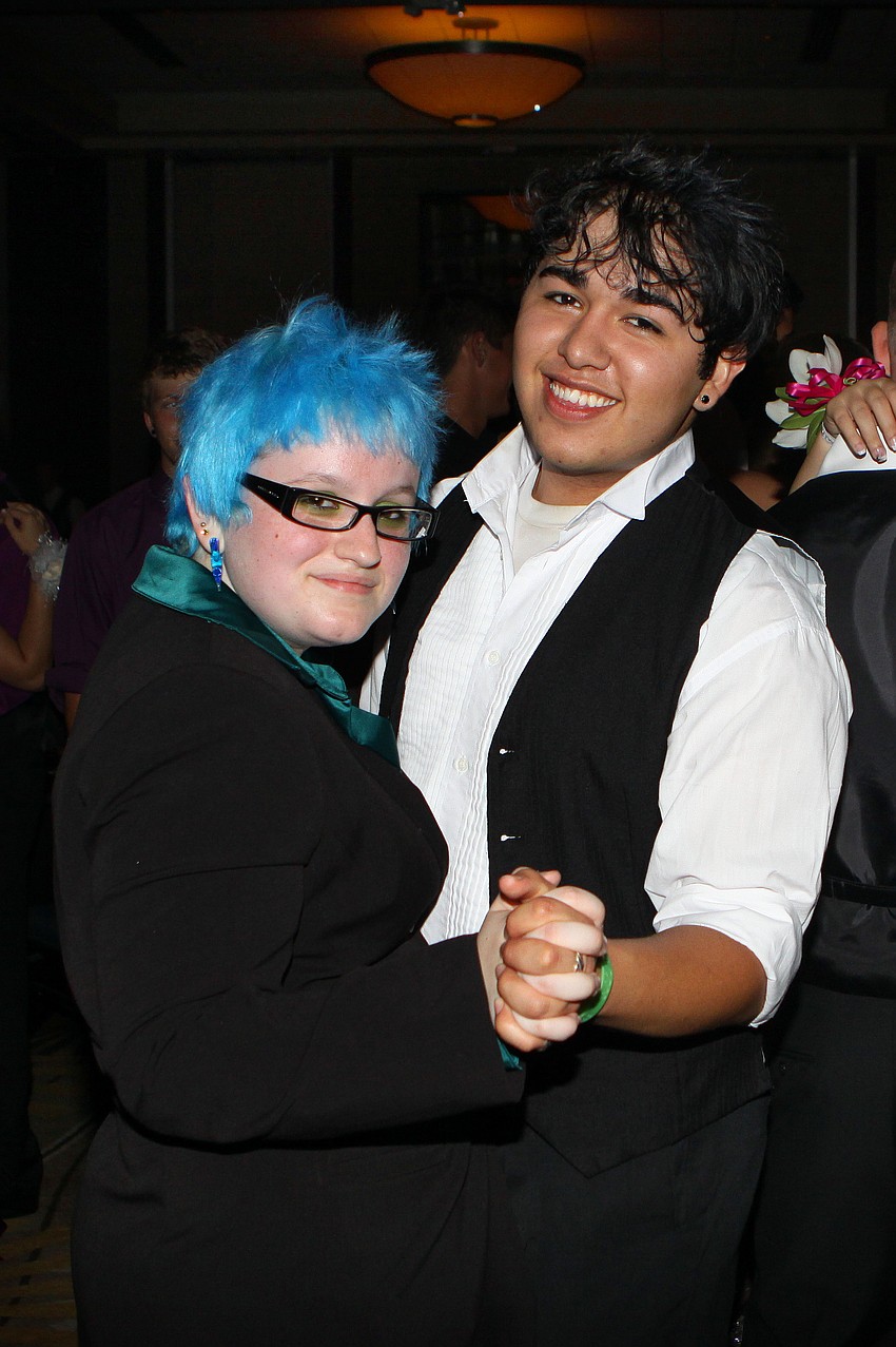 Olivia Ben-Tovim and Advichil Anzares dance together Saturday, May 14 at the Sarasota High School's prom at the Hyatt Regency.