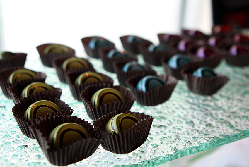 Some Norman Love Confections BLACK chocolates were a favorite treat for the people attending the 