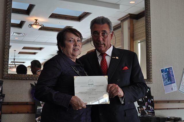 Louise Tessier, Coldwell Banker NRT, with Andrew Vac