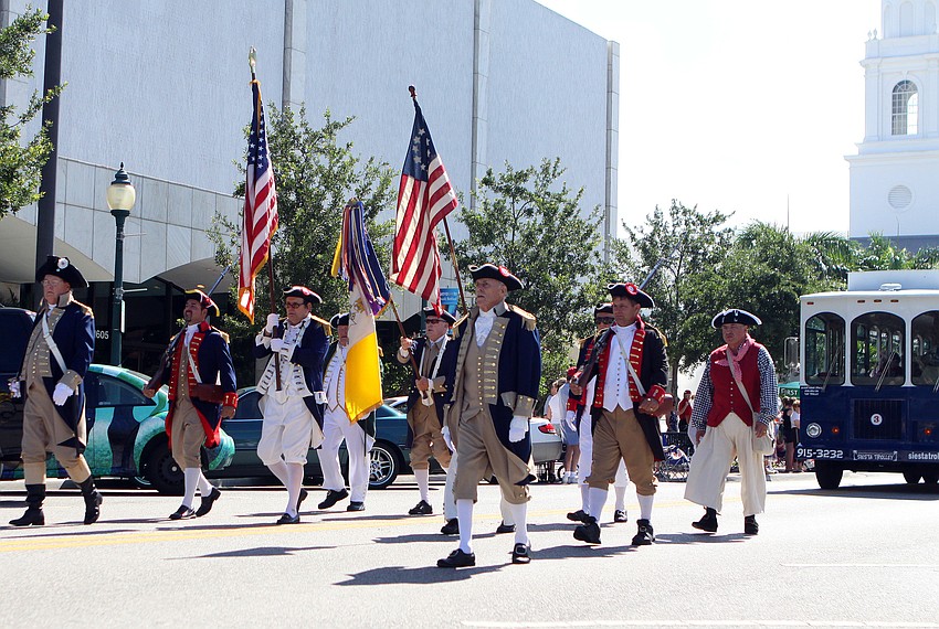 The Saramana Chapter of the Sons of the American Revolution march down Main Street Monday, May 30 during the Memorial Day parade.