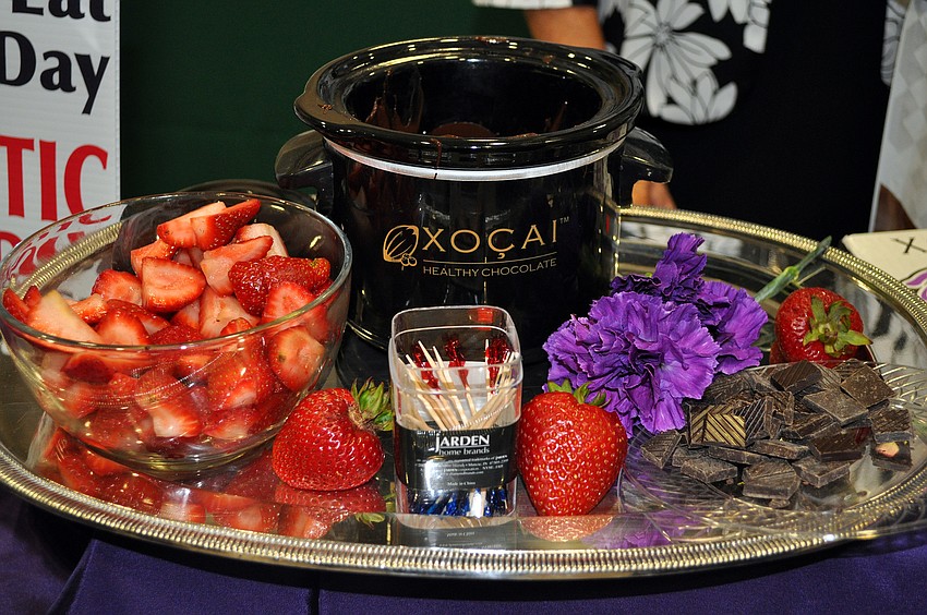 People were encouraged to try the healthy chocolate created by Xocai while they made their rounds Wednesday, July 13 at Sarasota Prime Time.