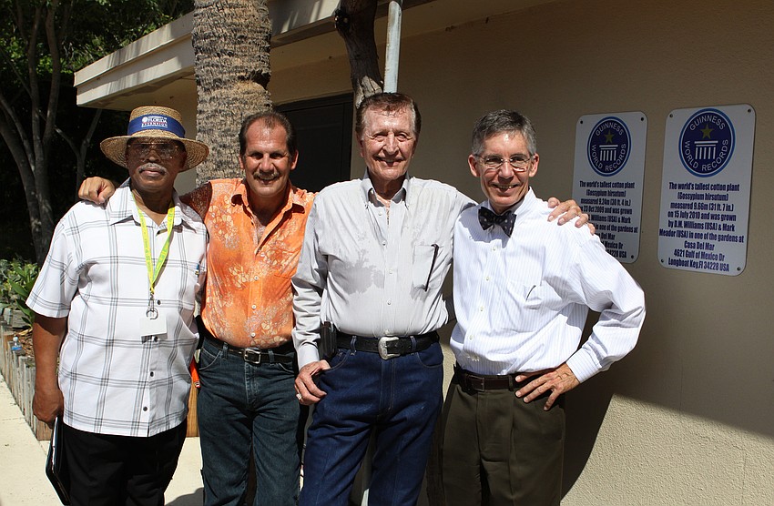 Ervin Shannon, Mark Meador, D.M. Williams and Matt Walsh pose together by the cotton plant after the measurement Friday, July 15 at Casa del Mar.